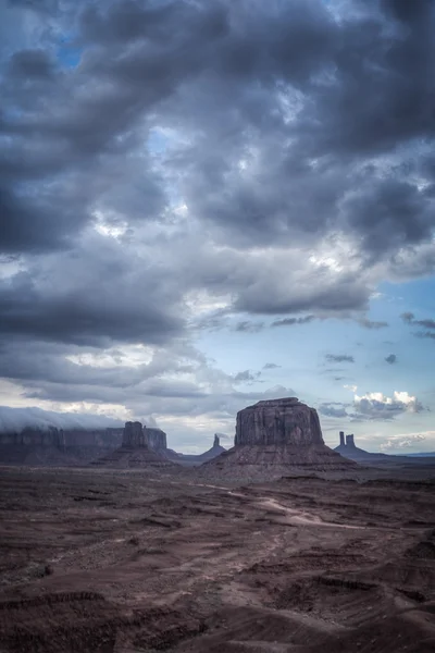 Big cloud horizontal on mesa in Monument valley