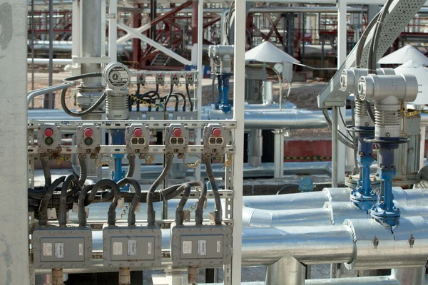 Pumps, cables and piping as found inside of factory