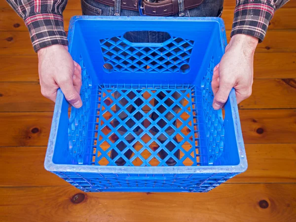 Man Holding Crate