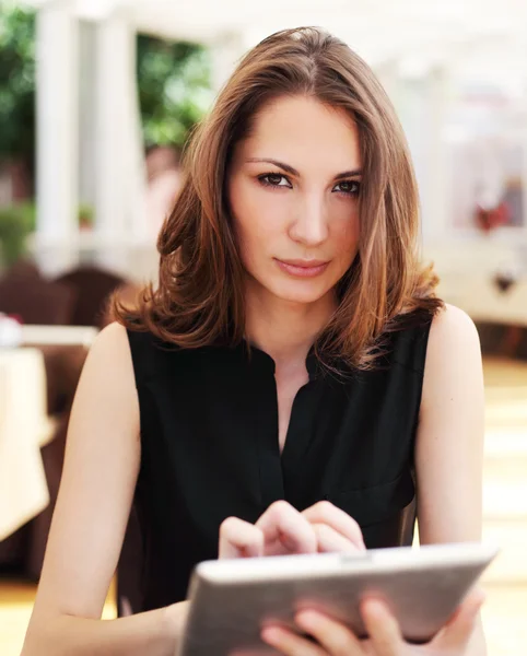 Woman with tablet computer