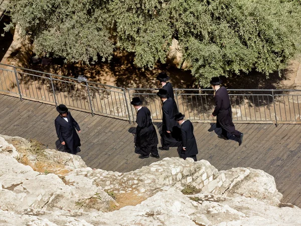Jews in national clothes go to the gates of the King David in Jerusalem