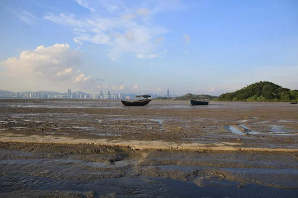 Mud road on the beach after tidal wave back in the city of china , hong kong