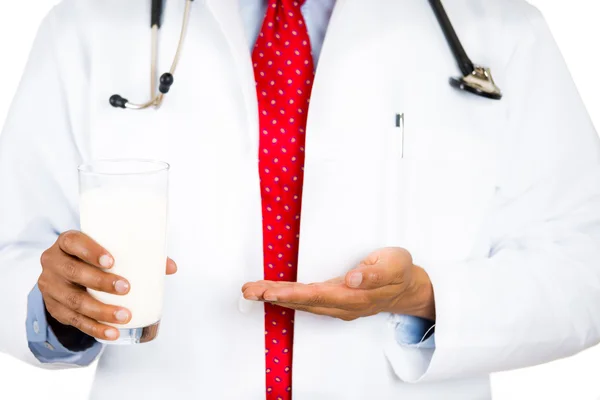 Doctor showing the need for milk for healthy bones and growth