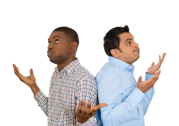 Closeup portrait of two men back to back putting hands in air looking up in frustration