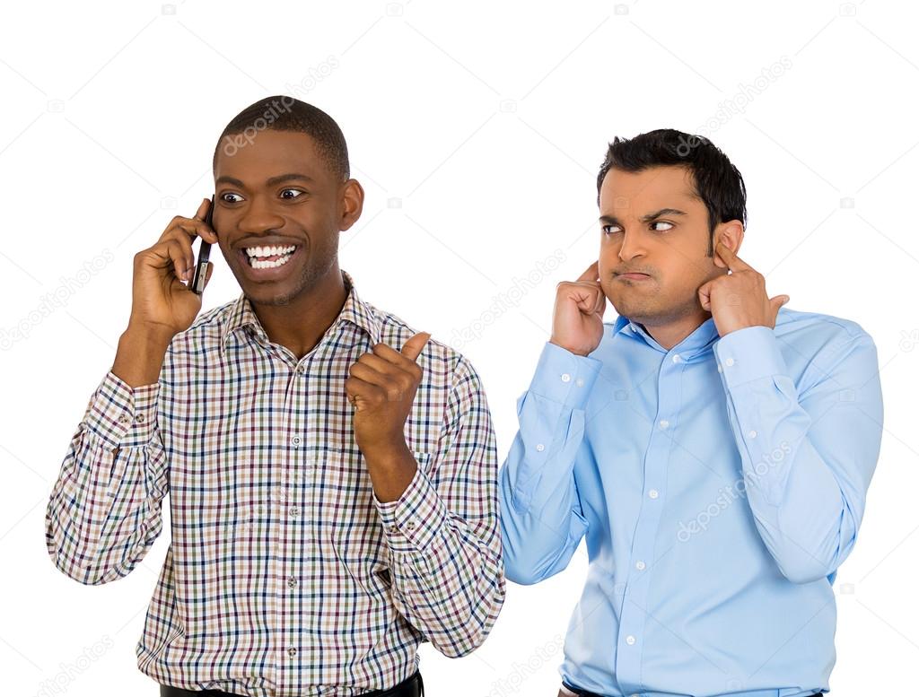 Closeup portrait of loud obnoxious rude guy talking loudly on cell