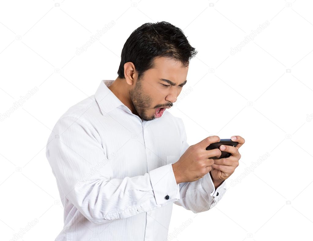 Shocked and disgusted man on phone — Stock Photo © atholpady 43522509