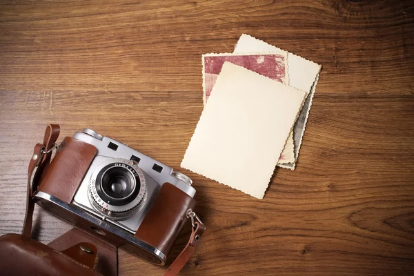 Old camera and old pictures album, old memories