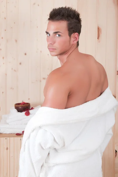 Back of a beautiful man in sauna