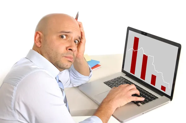 Worried business man in stress watching sales and finance collapse