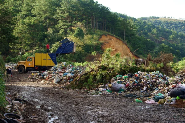 Garbage truck empty out the rubbish