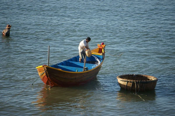 Fisherman wash the boat