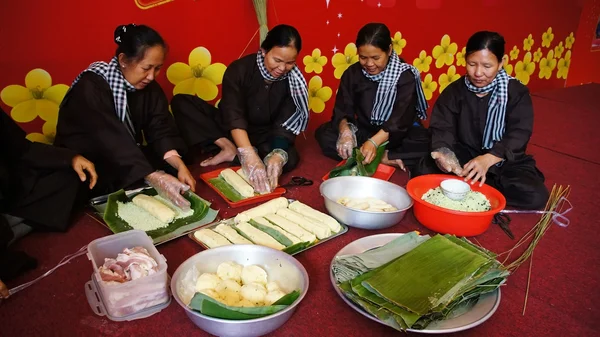 Group of people making traditional Vietnam food for Lunar New Ye