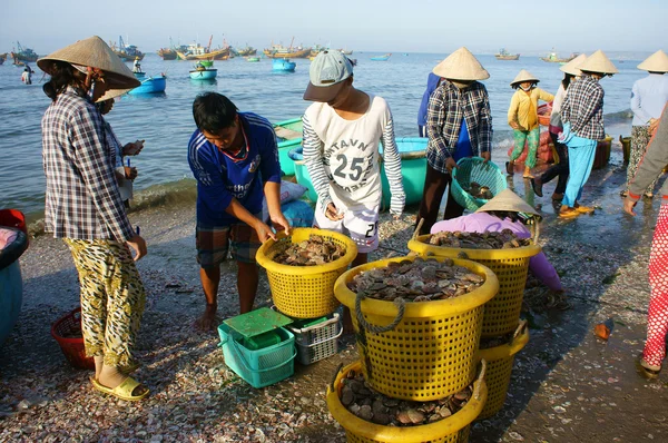 Crowed atmosphere at seafood market on beach