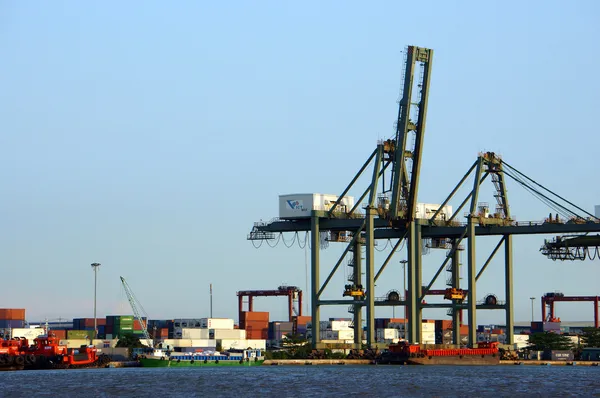 Loading container at port, maritime transport