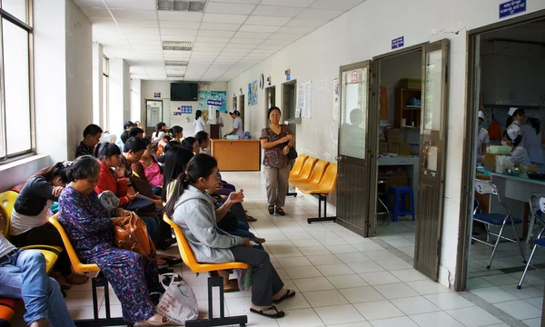 Sick people waiting at hospital