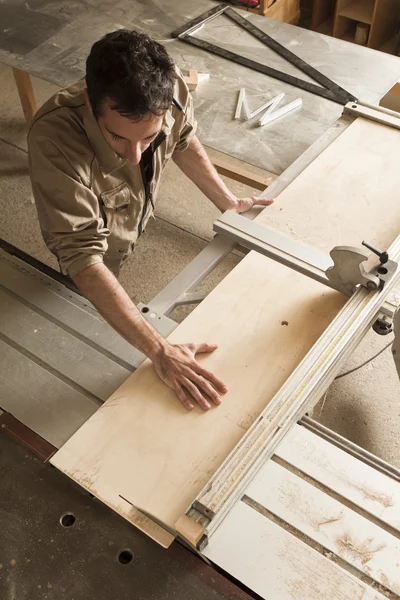 Young worker in joinery