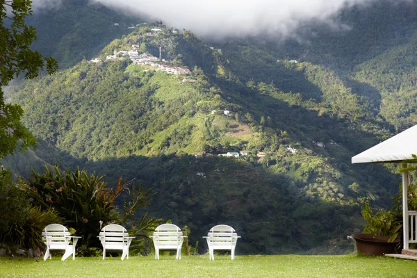 Mountain with white chairs
