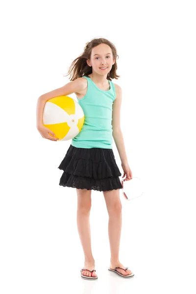 Girl posing with a beach ball