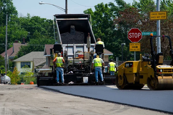 Dumping hot asphalt