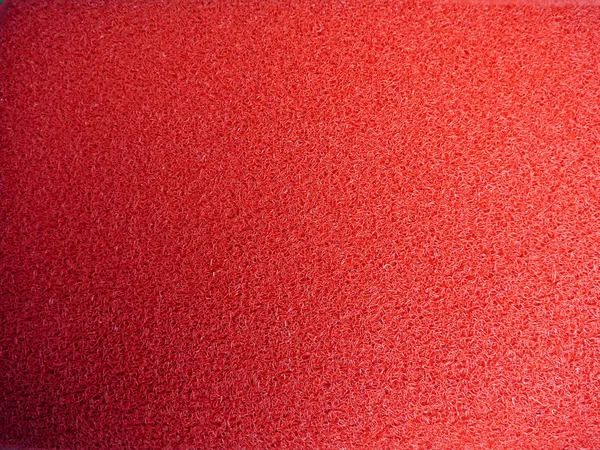 Red door mat .