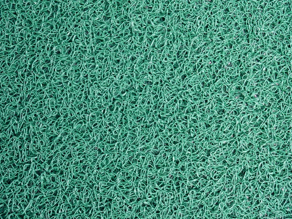 Green door mat .