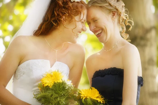 Bride And Bridesmaid Share Memories