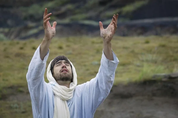 Jesus Lifts His Hands Towards The Heavens — Stock Photo #31611535