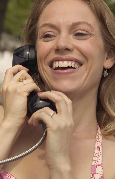 Woman On The Phone Laughing