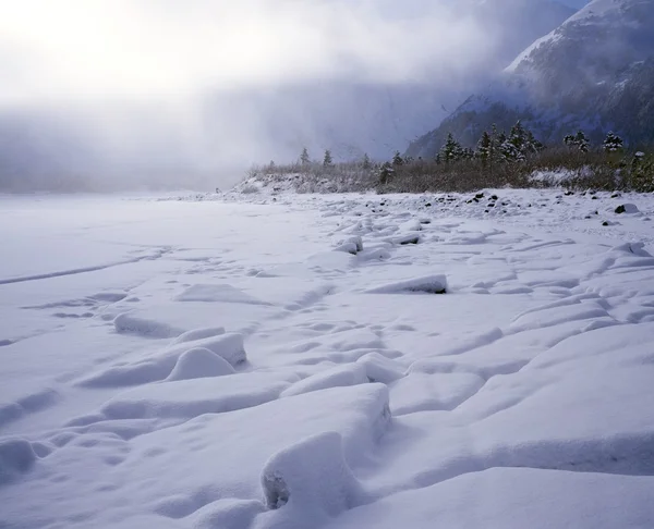 Fog Covering Drifting Snow And Ice, Portage Lake, Chugach Mountains