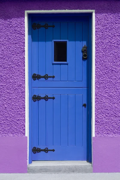 Purple Wall Blue Door