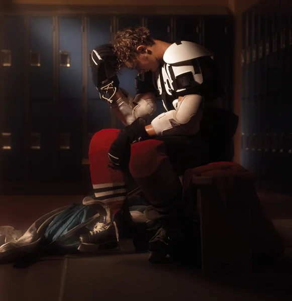 Hockey Player In Dressing Room