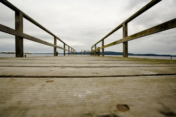 British Columbia, Canada. Surface Level View Of Wooden Dock, With A View Into Land