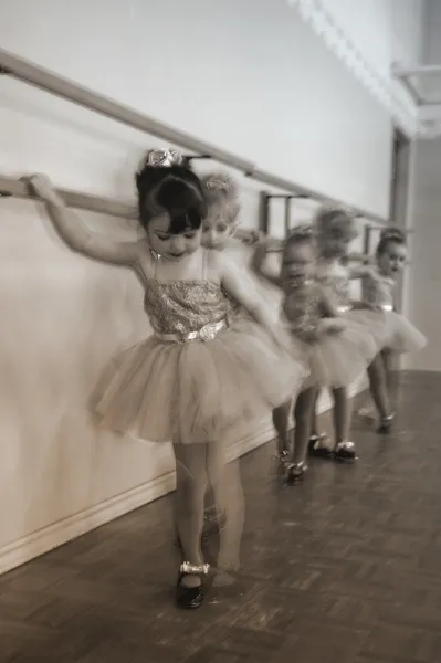 Little Girls Practice At Ballet Class