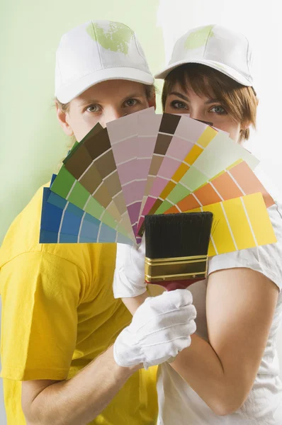 Couple Holding Paint Swatches