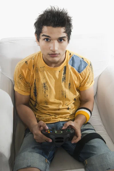 Man playing a video game — Stock Photo #33031881