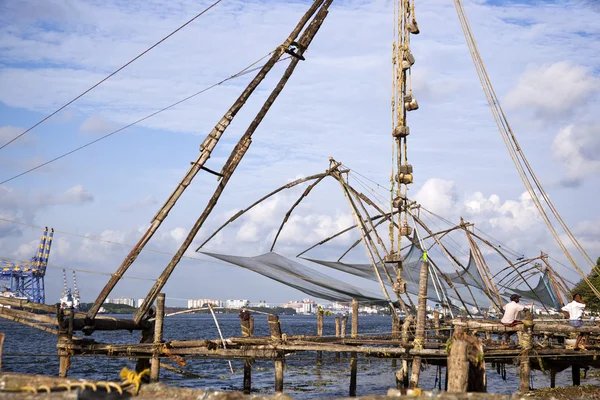 Chinese fishing nets at a harbor