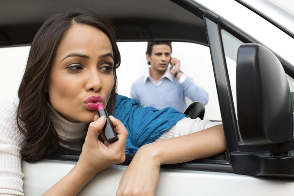 Woman in a car with her boyfriend