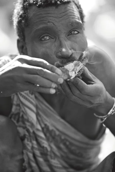 A moment in the daily life of the Hadza tribe of Lake Eyasi Tanzania.