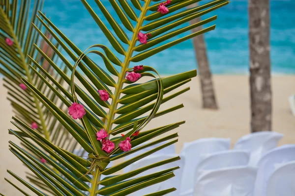 Arch with flowers on tropical sea