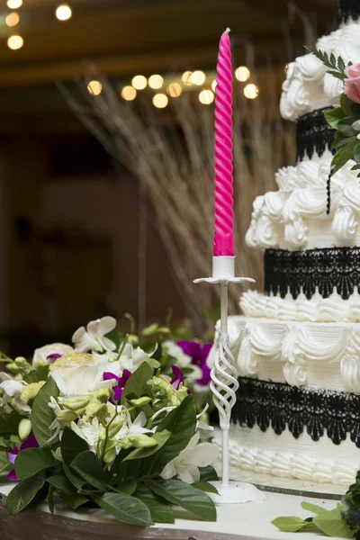 Pink candle in wedding ceremony