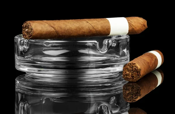Smoking cigar in an ashtray