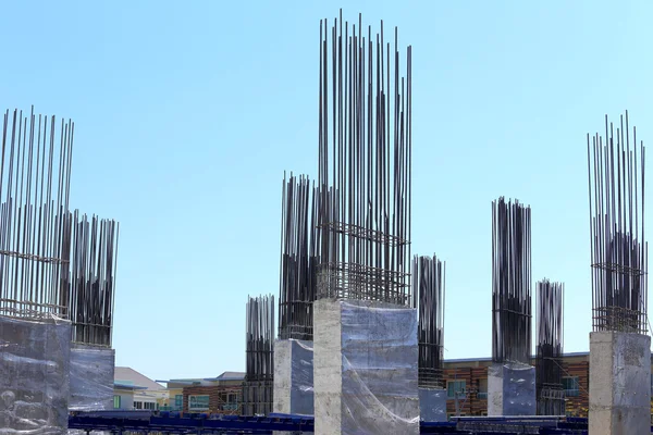 Building cement pillar in construction site with blue sky