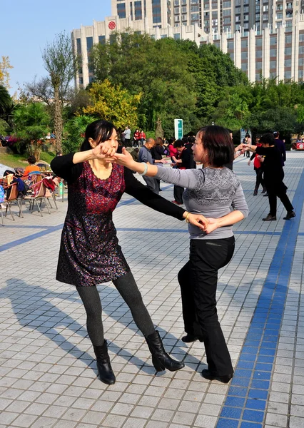Pengzhou, China: Two Women Dancing in Park