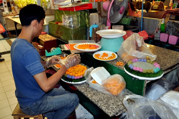 Bangkok, Thailand: Man Making Thai Candies