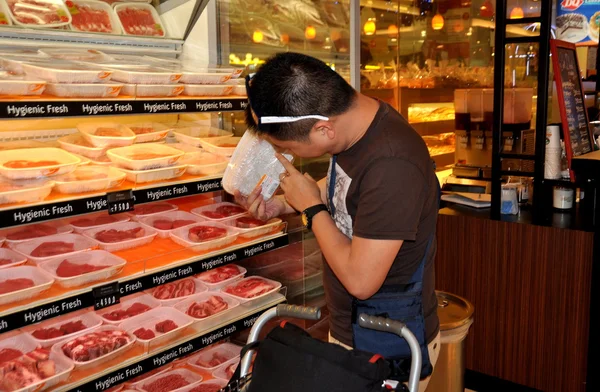 Bangkok, Thailand: Man Buying Meat at Siam Paragon Food Hall