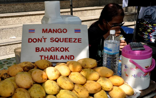 Bangkok, Thailand: Don\'t Squeeze the Mangoes Sign on Food Cart
