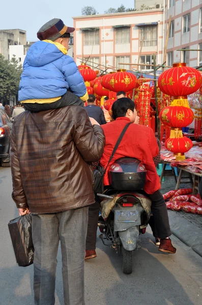 Pengzhou, China: Boy Sitting on Father\'s Shoulders