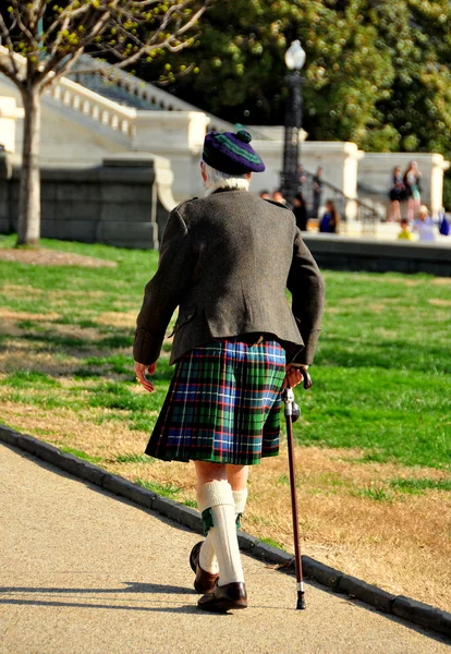 Wasington,DC: Man in Kilt Walking in Capitol Park