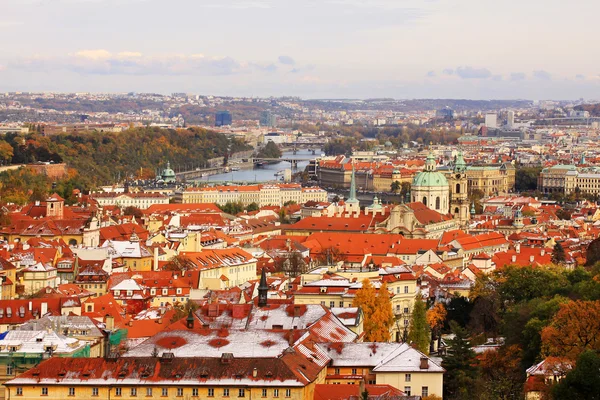 Romantic autumn snowy Prague City