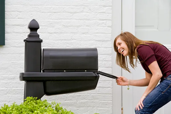 Woman Checking Mail